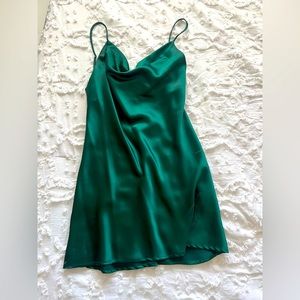Green flow dress, silky material, falls down in front in V shape